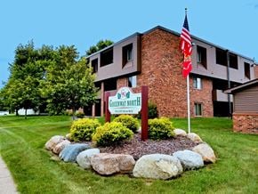 St Cloud apartment for rent - A brick building with a sign that says Greenway North.