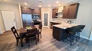 Lino Lakes apartment for rent - a kitchen and dining area with a table and chairs