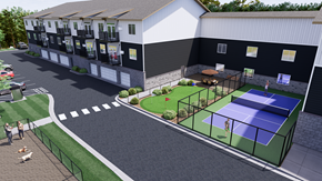 Annandale apartment for rent - A tennis court is located in front of a white building.
