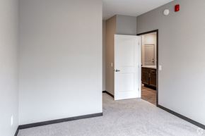 Cold Spring apartment for rent - an empty bedroom with a door open to a bathroom