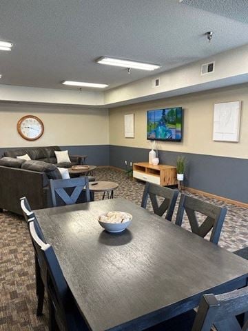 Stillwater apartment for rent - a living room with a table with a bowl of food