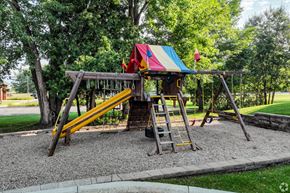 St Augusta apartment for rent - a swing set on the playground in a park