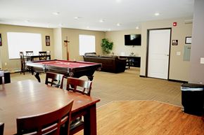 St Cloud apartment for rent - A room with a pool table and a tv.