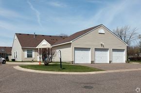 Coon Rapids townhouse for rent - Exterior w/ Garages