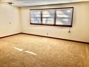 Morris apartment for rent - A room with a carpeted floor and a window with blinds.