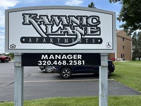 Pierz apartment for rent - A sign for Kawanico Apartments with a phone number for the manager.