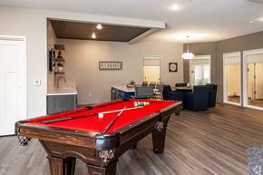 Clear Lake apartment for rent - A pool table in a room with a sign that says "Lakeside.".