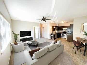Sartell townhouse for rent - a living room with a couch and a table