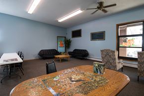 Milaca apartment for rent - A living room with a jigsaw puzzle on the table.