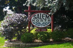 St Cloud apartment for rent - A sign for Salem North with a red cross on it.