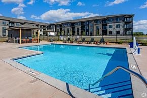 Monticello apartment for rent - our apartments have a resort style pool with lounge chairs