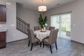 Cambridge townhouse for rent - A dining room with a table set for four.