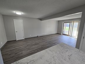St Cloud apartment for rent - A room with a door and a window.