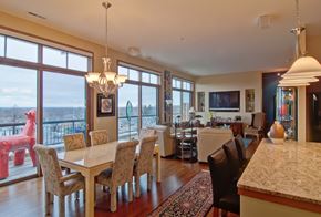 Shorewood apartment for rent - A dining room with a table and chairs and a chandelier at Cornerstone & Ravenna* Apartments, Shorewood