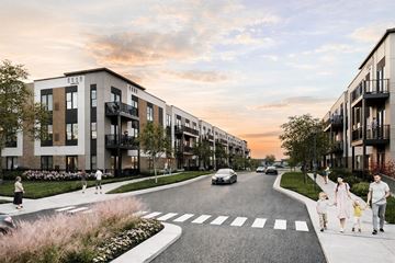 Pleasant Prairie apartment for rent - A family crossing the street at a pedestrian crossing.