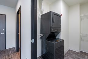 Milwaukee apartment for rent - A black oven is built into a kitchen island.