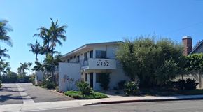 Costa Mesa apartment for rent - A white house with the number 2152 on it.