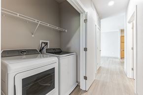 Cleveland townhouse for rent - a laundry room with two washes and a dryer in a house