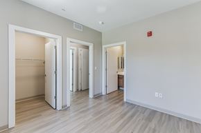 Cleveland townhouse for rent - a living room with a hard wood floor and white doors