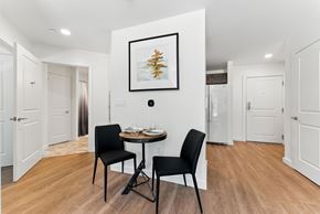 Stow apartment for rent - A dining room with a table and two chairs.