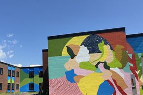 Northampton apartment for rent - A large mural of a face on a building.
