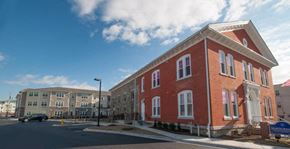 Elkton apartment for rent - a red brick building on the corner of a street
