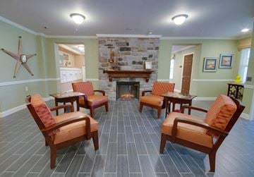 Elkton apartment for rent - a living room with chairs and a fireplace