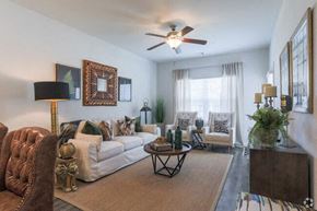 Bloomingdale apartment for rent - A living room with a brown and white color scheme.