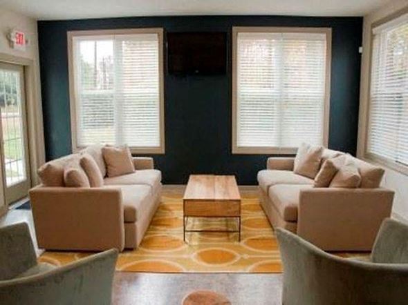 Durham townhouse for rent - Living room with two couches at Emory Woods Apartments, Durham, NC, 28205..