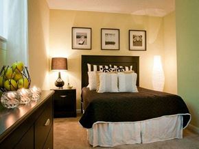 Durham townhouse for rent - Bedroom with a queen size bed at Emory Woods Apartments, Durham, NC.
