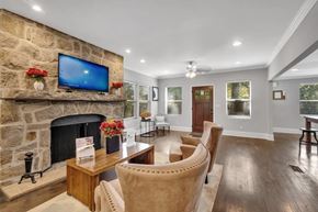 Avondale Estates apartment for rent - A Living Room With Fireplace at Avondale Place Apartments, Avondale Estates, GA, 30002