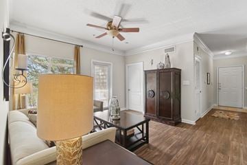 Gainesville apartment for rent - A living room with a brown table and a white sofa.
