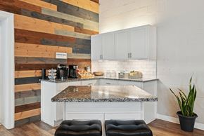 Charlotte apartment for rent - Kitchen with white cabinets and a marble counter top  at Emerald Bay, Charlotte, 28217