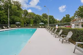 Charlotte apartment for rent - Pool with Chairs at The Highlands Apartments, North Carolina, 28217