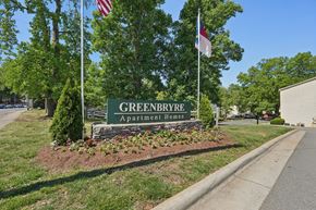 Charlotte apartment for rent - A sign for Greenbrye Apartment Homes is in front of a tree.