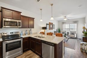 Bloomingdale apartment for rent - Kitchen with stainless steel appliances and a granite counter top