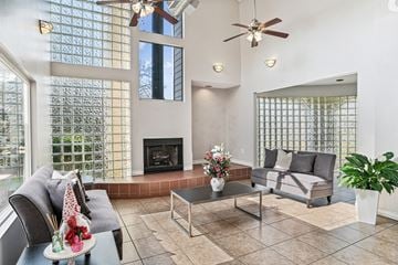 Charlotte apartment for rent - a living room with couches and a fireplace