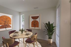 Landover Hills apartment for rent - A dining room with a round table and chairs.
