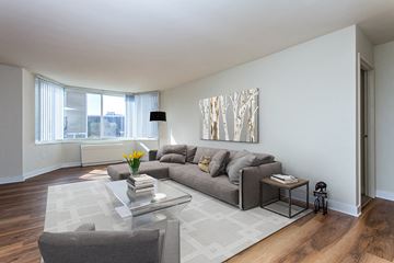 Alexandria apartment for rent - a living room with a couch and a coffee table