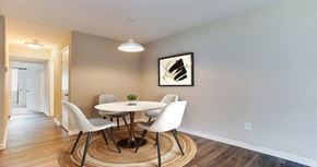 Newport News apartment for rent - A dining room with a round table and chairs.