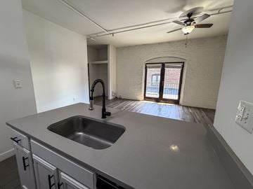 Richmond apartment for rent - A kitchen with a sink and a window.