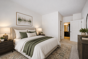 Mclean apartment for rent - A bedroom with a large bed and a painting on the wall.
