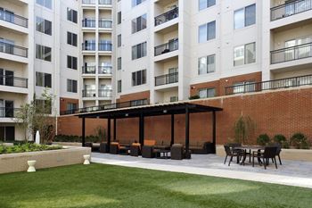 Courtyard with lounge seating & pergola