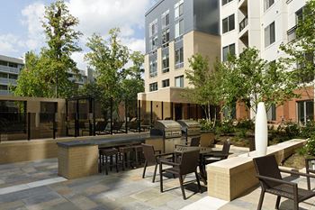 Outdoor eating area with grills