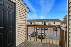 Portsmouth apartment for rent - the view from the front door of a house with a parking lot