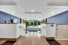 Bethesda apartment for rent - A lobby with a pool table and a white door.