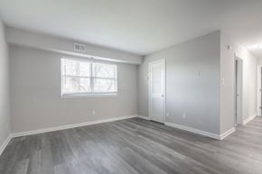 Norfolk townhouse for rent - A room with a window and a door.