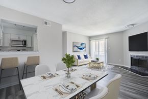 Newport News apartment for rent - A modern dining room with a marble table and chairs.