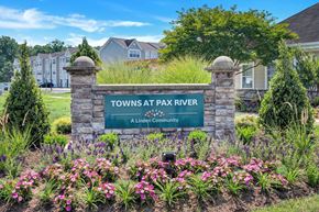 Lexington Park townhouse for rent - a sign that says towns at park river