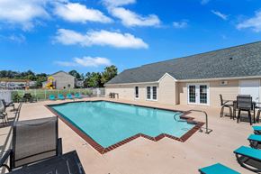Fredericksburg townhouse for rent - our resort style pool is open to the community and is surrounded by chairs and tables